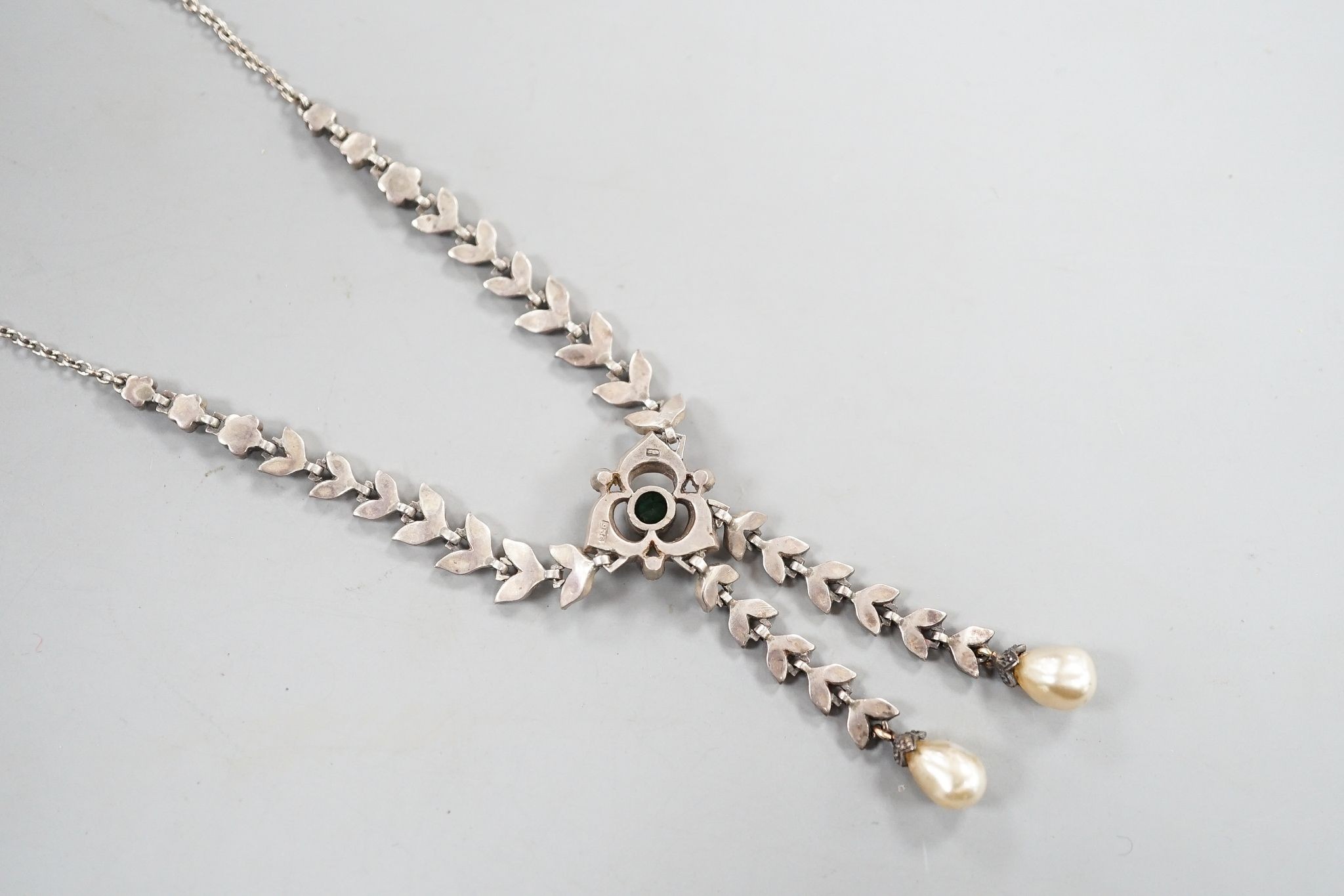 An antique white metal, two colour paste and simulated pearl set drop pendant necklace, 47cm.